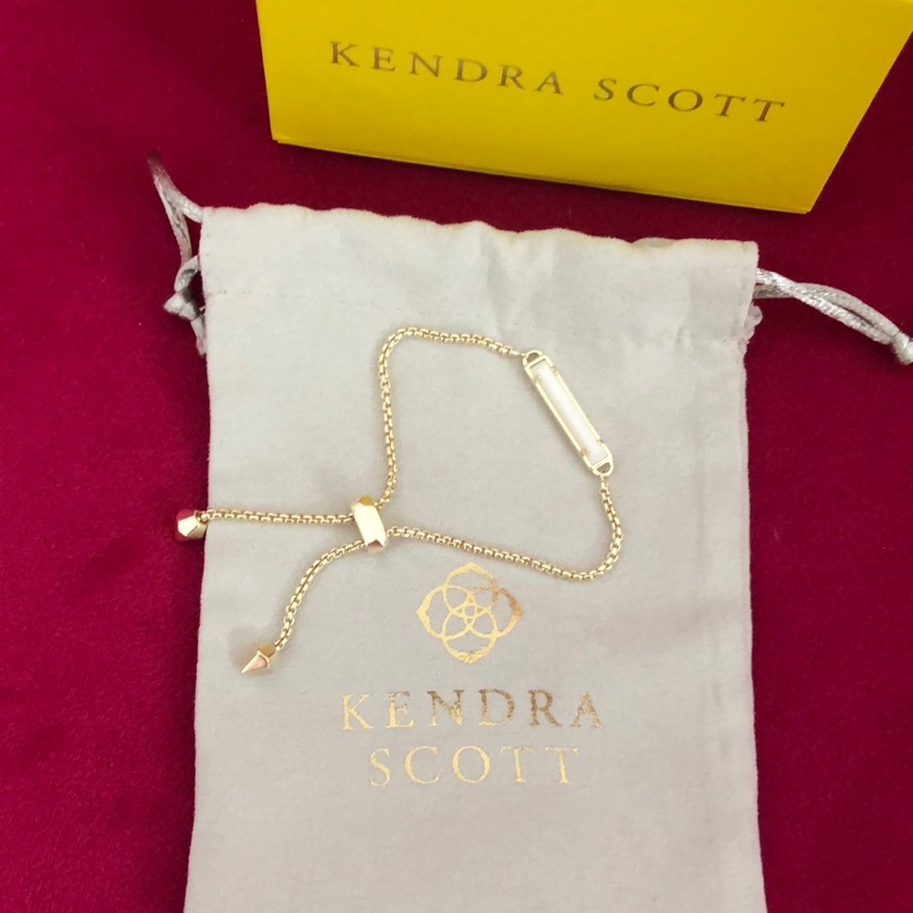 Kendra Scott Gold Bracelet with white stone.